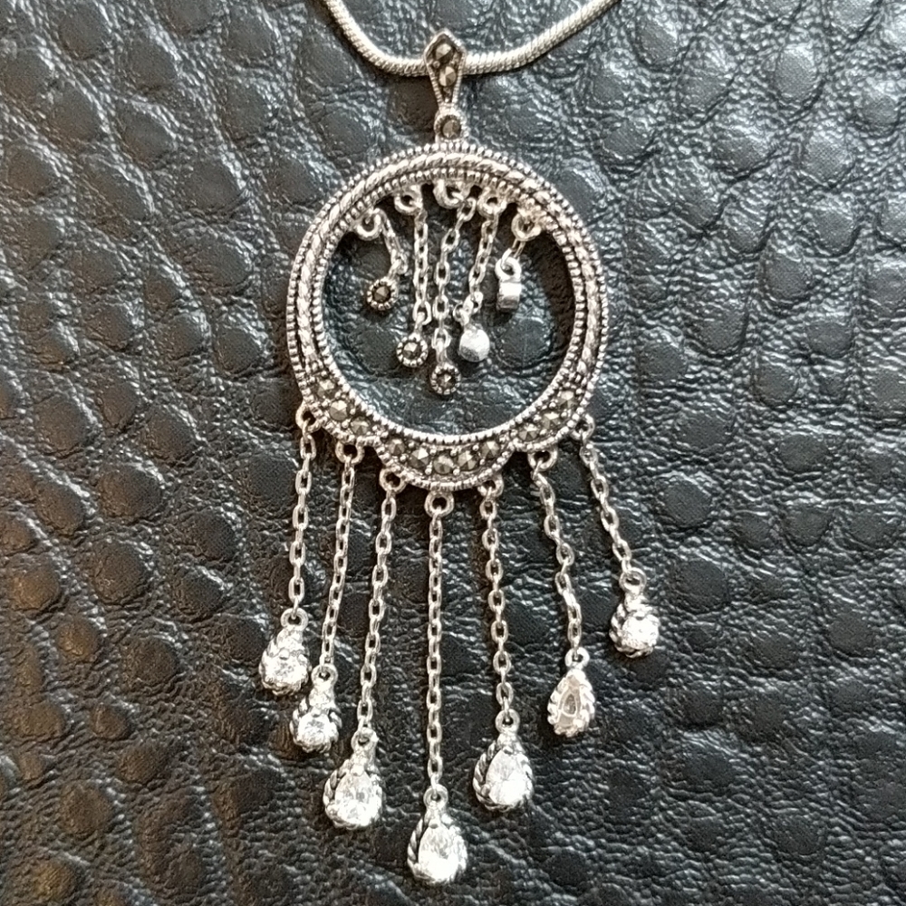 Crystal pendant and marcasite necklace